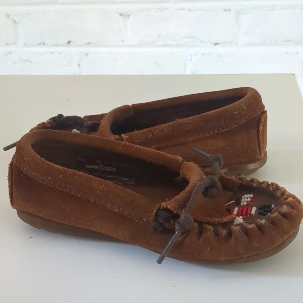 Minnetonka beaded thunderbird slip on Moccasin